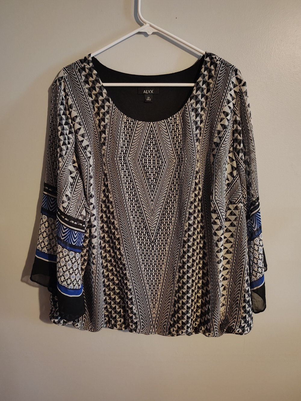 Alyx Black and White Geometric Print Women’s Top with Blue Accents
